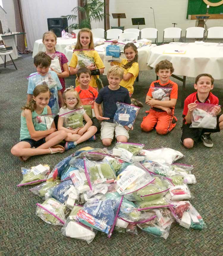 FPC kids help pack disaster kits