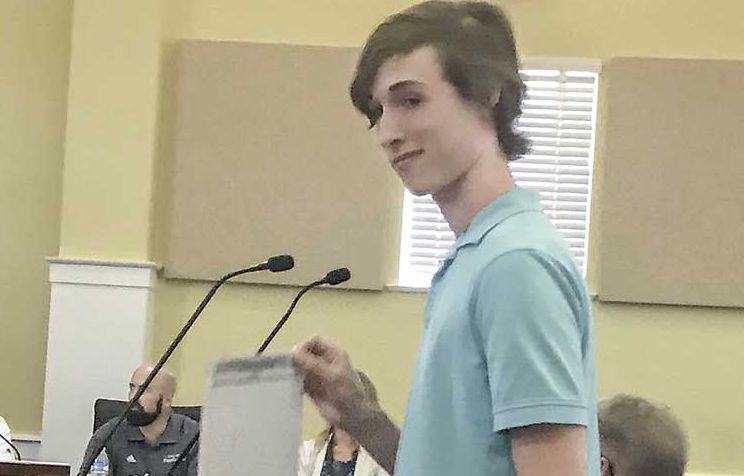 Young flag fan objects to Fayetteville banner, w...