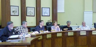 Members of the Fayetteville Planning and Zoning Commission include, from left, commissioners Ken Collins, Toby Spencer, Brett Nolan, Chairman Sarah Murphy and commissioners Debi Renfroe and Joe Clark. Photo/Ben Nelms.