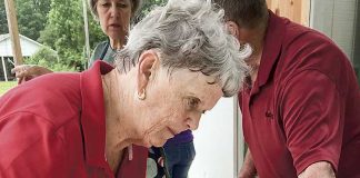 Hopewell UMC member, Beth James, carefully fills jars with freshly made strawberry jam. The strawberries come from the Tyrone church’s garden and members and neighbors pitch in to can the harvest. Photo/Sandy Golden.