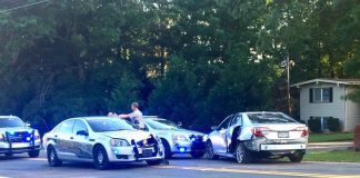 Fayette County deputies investigate the aftermath of a high speed chase that began in Riverdale and ended in north Fayette. Photo/Steve Stanley.