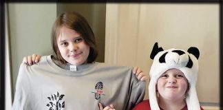 Lucy and Will Ward show off a T-shirt for event participants. Photo/Submitted.