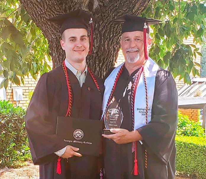 Zachary Pye, 22, and his father, Peachtree City Assistant Police Chief Stan Pye, 58, earned degrees from Georgia Military College June 1. Photo/Submitted.