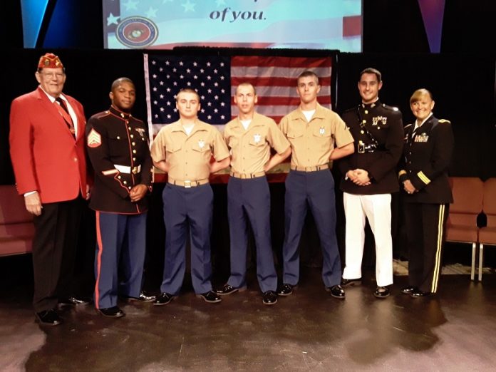 Participating in a local U.S. Marine Corps boot camp graduation after ceremonies on Paris Island were cancelled due to Hurricane Dorian were, from left, Guy Mitchell (USMC), Sergeant Quayshaun Spence (USMC), Pvt. Clay Fordham, Pvt. Aaron Hornbuckle, PFC David Wilkins, PFC Riley Walsh (not pictured), Captain Sabia (USMC) and Brigadier General Nikki Griffin-Olive (US Army). Photo/Submitted.