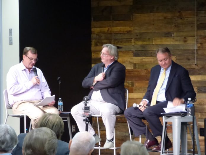 Moderator Steve Brown, at left, was joined by Fayette County Board of Education Chairman Scott Hollowell and school board member Barry Marchman for a Sept. 10 meeting with parents at The Bridge Community Center in Peachtree City. Photo/Ben Nelms.