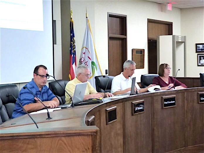 Peachtree City Planning Commission members at the Sept. 9 meeting included, from left, non-voting alternate Commissioner Scott Ritenour, Vice Chairman J.T. Rabun and commissioners Paul Gresham and Lisa Ann Curtis. Photo/Ben Nelms.