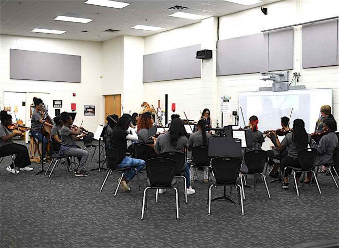 Fayette County High School Orchestra students perform for composer. Photo/Fayette County School System.