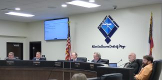 The Fayette County Board of Education on Nov. 4 voted 4-1 to build a $46 million replacement school for Booth Middle School in Peachtree City. Pictured, from left, are board members Brian Anderson and Barry Marchman, Superintendent Jody Barrow, Chairman Scott Hollowell, and board members Roy Rabold and Leonard Presberg. Photo/Ben Nelms.