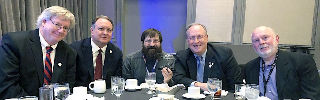 The Leading Edge Award was presented to the school system at an awards luncheon during the annual Georgia School Boards Association conference in Atlanta. (L-R) Fayette County Board of Education members Scott Hollowell (chairman), Dr. Barry Marchman, Leonard Presberg, Fayette County Public School Superintendent Dr. Joseph Barrow, and Fayette County Board of Education member Roy Rabold (vice-chair). Photo/Fayette County School System.