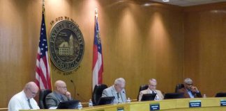 Members of the Fayette County Commission at the Feb. 13 meeting included, from left, commissioners Eric Maxwell and Edge Gibbons, Chairman Randy Ognio and commissioners Chuck Oddo and Charles Rousseau. Photo/Ben Nelms.