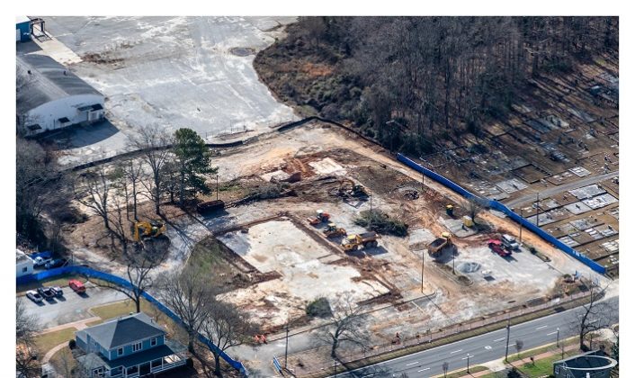 What was once the site of the school system central office on Stonewall Avenue in Fayetteville gave way to crews in January preparing the property for the new Fayetteville City Hall, expected to open next year. Photo/Comprehensive Program Services.