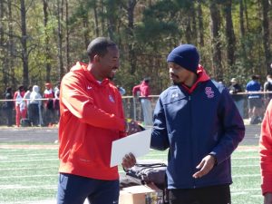 Olympian Christian Taylor comes home to Sandy Cr...