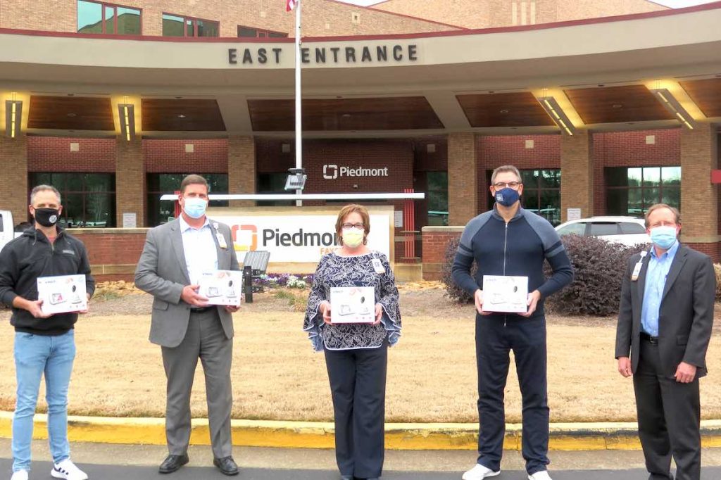 From left are Southside Church Lead Pastor (Peachtree City) Pastor Jason Dixon, Piedmont Fayette CEO Steve Porter, Piedmont Fayette Chief Nursing Officer Merry Heath, Southside Church Lead Pastor Chris Patton and Piedmont Fayette COO Nathan Nipper. Photo/Submitted.