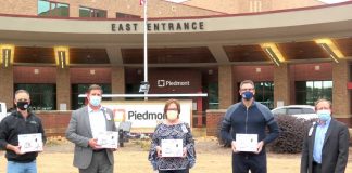 From left are Southside Church Lead Pastor (Peachtree City) Pastor Jason Dixon, Piedmont Fayette CEO Steve Porter, Piedmont Fayette Chief Nursing Officer Merry Heath, Southside Church Lead Pastor Chris Patton and Piedmont Fayette COO Nathan Nipper. Photo/Submitted.