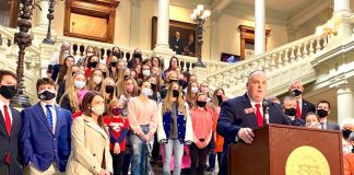 Dozens of student athletes in Georgia girls’ sports joined state Rep. Phillip Singleton (at podium) to support his bill banning transgender participation on Feb. 4, 2021. Photo/Beau Evans of Capitol Beat.