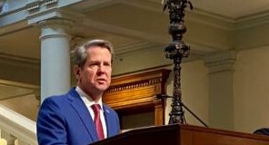 Georgia Gov. Brian Kemp speaking at the state Capitol.