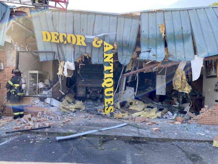 Look closely to see a dump truck inside an antique store on Ga. Highway 85 North in Fayetteville. The truck crashed through the front of the building Thursday morning. Photo/Fayetteville Fire Department.