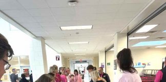 Whitewater High School staff members prepare to treat faculty, students and families to a tailgate feast before Homecoming recently. Photo/Ashley Maddox.