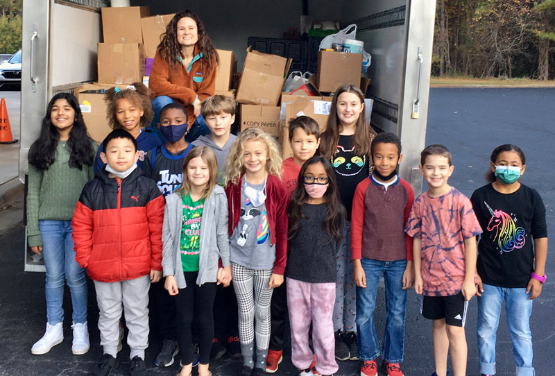 Huddleston helps out with food drive