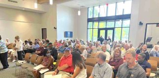 View of the crowd at Fayetteville City Hall for the City Council decision on annexing 412 acres for a data center. Photo/Ben Nelms.