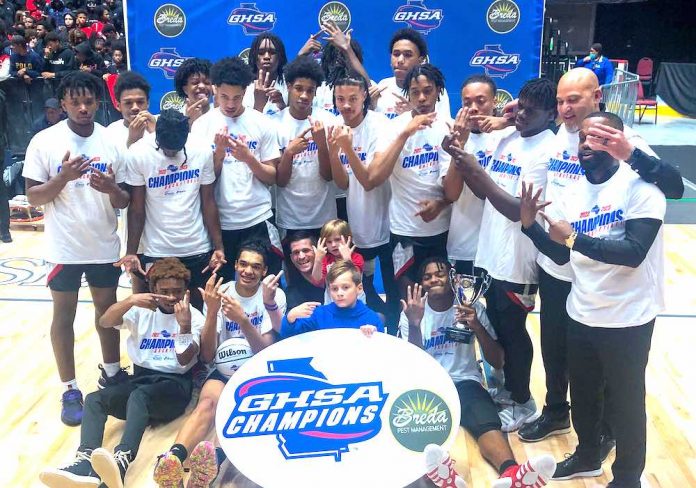 The Sandy Creek Patriots celebrate bringing home Fayette County's first-ever state basketball championship. Photo/Fayette County School System.