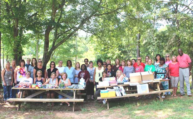 Heritage presents gifts, donations to Inman Elem...