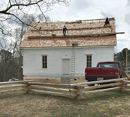 Hand-split shake roof installed during historic ...