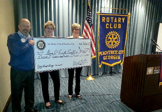 Rotary Club makes donation to Real Life Center