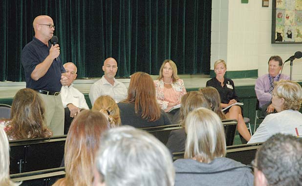 Parents grill school officials on mold report