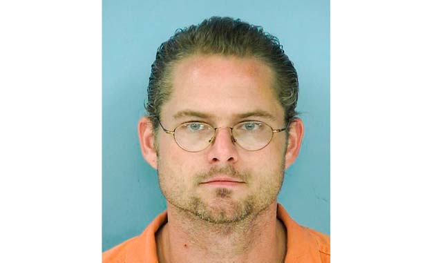 Son armed with pistol arrested for beating his f...