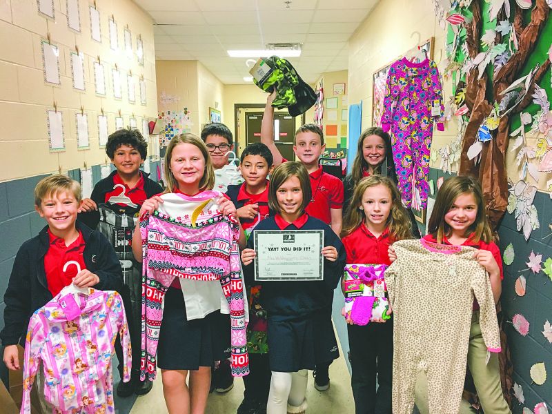 Coweta Charter Academy students gather pajamas, ...