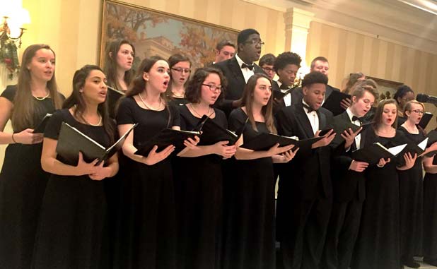 Students sing in a special setting